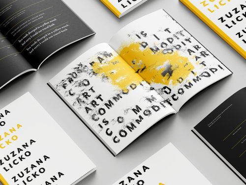 Zuzana Licko type specimen magazine with abstract black text and yellow paint streaks, surrounded by other magazines on a light gray surface.